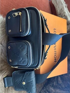 Brand new Louis Vuitton Brown Monogram Interior with Black Leather Trim